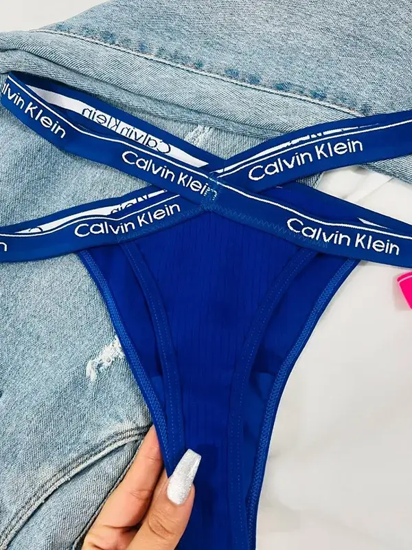 شورت زنانه برند Calvin Klein با کمربند کش‌دار سفید در رنگ‌بندی متنوع